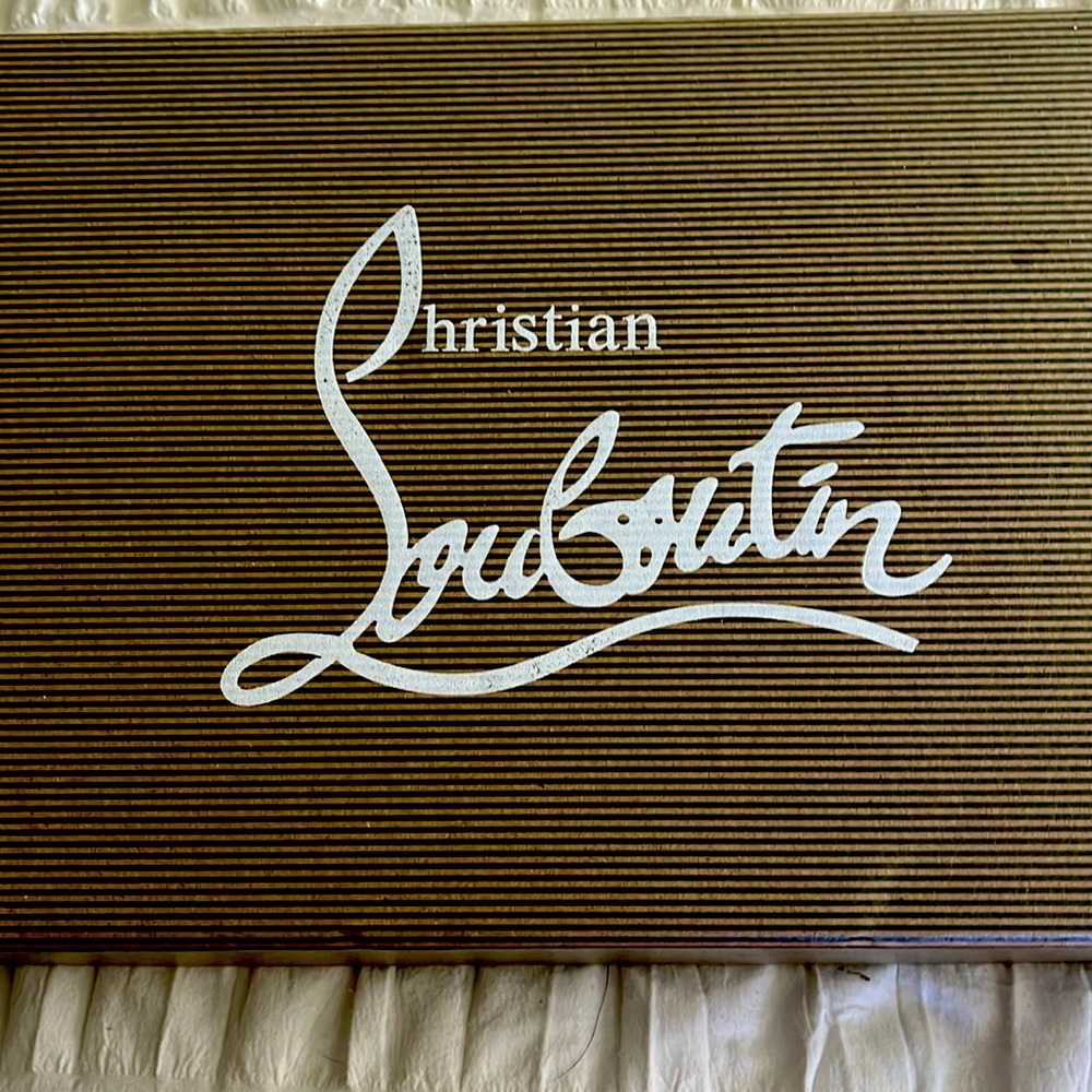 Christian Louboutin patent leather heels. Never worn size 8.